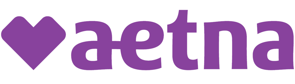 The image shows a logo with the text  AETNA  in purple letters against a grey background.